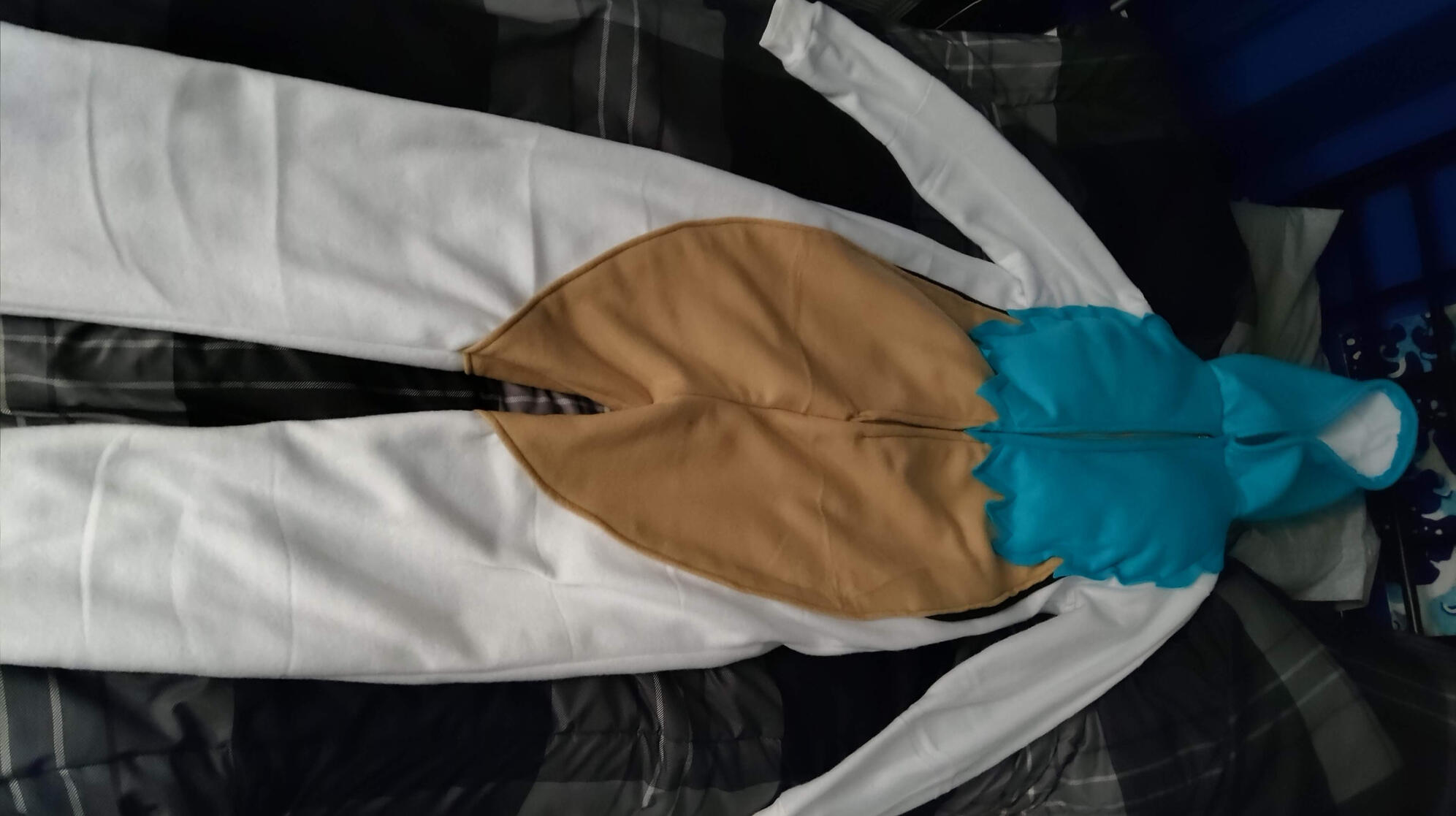 Attached halves and hood